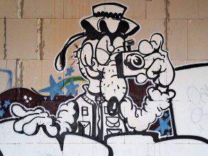 Graffiti: Fotografierende Comicfigur